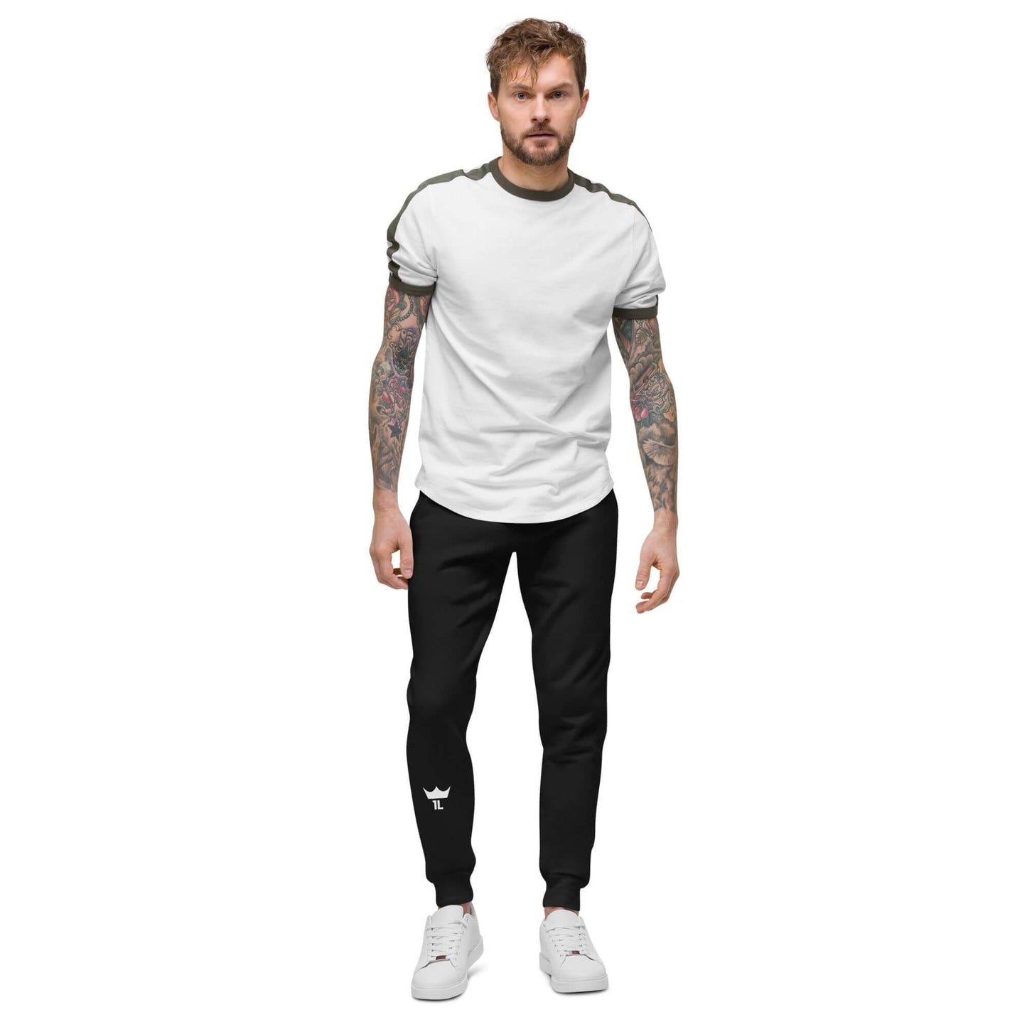 man wearing black sweatpants with white 1L logo on the right shin